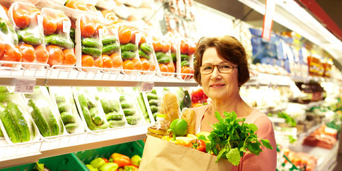 Image of senior woman in groceries department